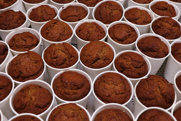 preparation of baked date pudding in white cups