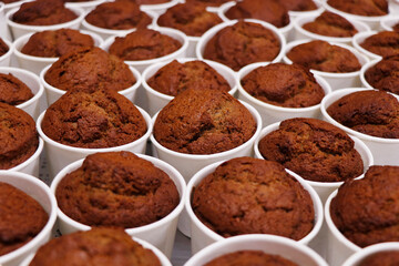 production of baked date pudding in white cups