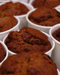 production of baked date pudding in white cups