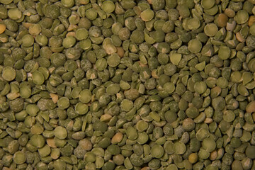Background of green pea groats. Top view.