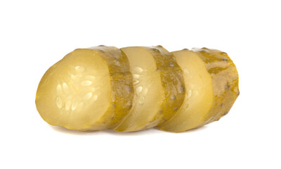 Fresh sliced green pickles isolated over white background
