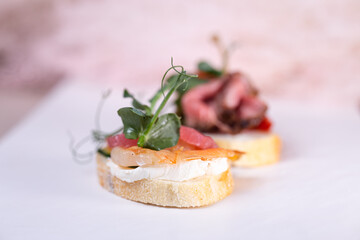 bruschetta with shrimp and cheese cream close-up