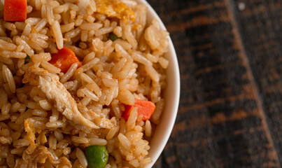 Bowl of Fried Rice on a Wooden Table