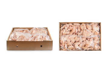 Raw, frozen chicken wings in a cardboard box on an isolated white background. Top view. Side view. Copy space.Industrial chicken selling and producing.
