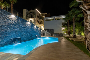 Hotel swimming pool in the night
