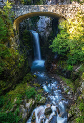 Waterfall under stone bridge in Washington State