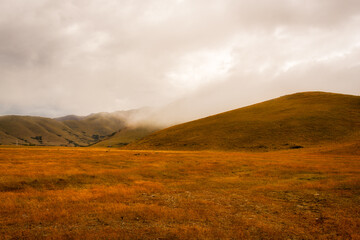 I love the tranquility, simplicity and colours of a hot dry summer with some desperately needed rain in the rural hills in Tekapo