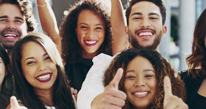 Well back you all the way. 4k video footage of a group of businesspeople giving thumbs up while standing in their office.