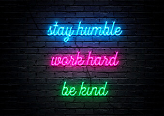 Blue, pink and green neon sign motivational quote with brick wall background; Stay humble, work hard, be kind. - obrazy, fototapety, plakaty