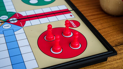 Red player pawn for ludo game with four pawns