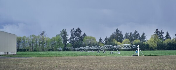 cultivated field with modern irrigation system