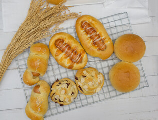 Fresh fragrant bread and bun on the table with copy space. Food concept