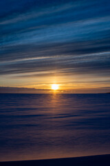 Fototapeta na wymiar Sunrise over frozen Lake Huron