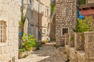 Fototapeta na wymiar very beautiful narrow streets in Montenegro with rocky houses