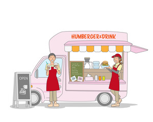 ハンバーガー販売のキッチンカーで働く女性
