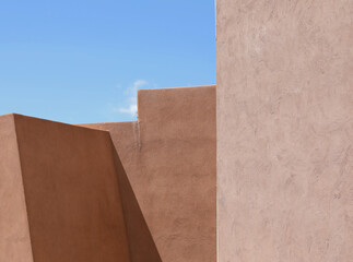 Terracotta color adobe walls composition.