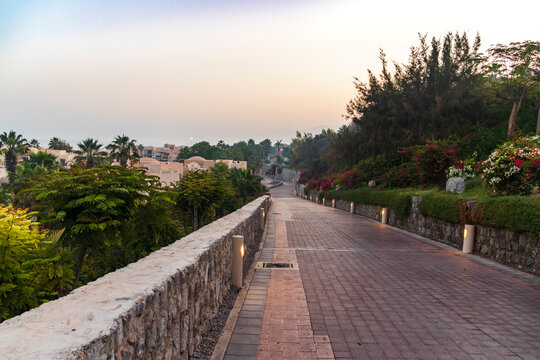 Shot Of A Stone Road Going Downhill . Concept