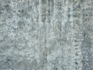 aged street gray concrete wall with crack, texture background