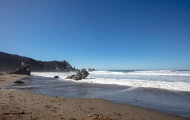Beach pebbles at original Ragged Point at Big Sur on the Central Coast of California United States