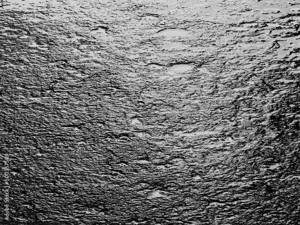 Wall mural wet asphalt road texture after rain