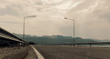 road and mountain before sunset