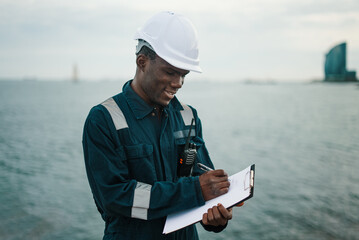 Marine navigational officer or chief mate on navigation watch on ship or vessel