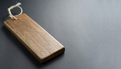 Fototapeta premium Kitchen table varnished on a gray background. Empty table. Copy space.