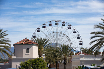 Daytime palm framed view of the Orange County downtown skyline of Irvine, California, USA.