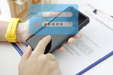 Hands catching the green screen of a mobile phone Login, password site page, user name page, use...
