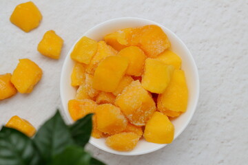 Frozen mango slices for dessert
