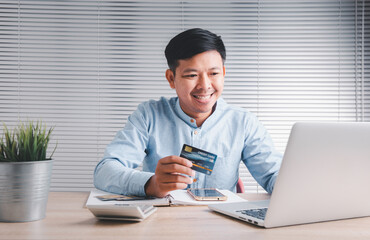 Online credit card payment for purchases from online stores and online shopping ,transfer money, Credit card close up shot