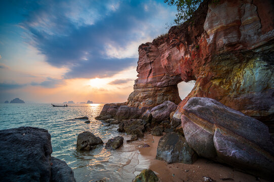 Landscape photography with sunset or sunrise behind the rock , seascape