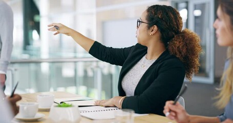 Around the room. 4k video footage of a handsome mature businessman giving a presentation in the boardroom. - Powered by Adobe