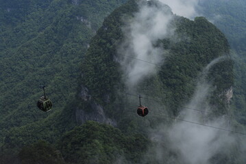 overlooking the mountains and cloud in the cable car