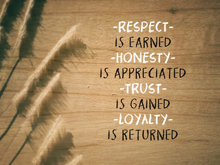 Encouragement quote of respect is earned honesty is appreciated trust is gained loyalty is returned. Written on wooden surface. Stock photo. - obrazy, fototapety, plakaty