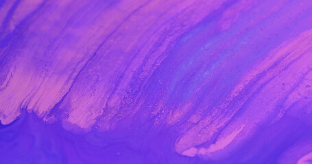 Ink water flow. Fluid spill. Glossy polish blend. Defocused fluorescent pink purple blue color wet...