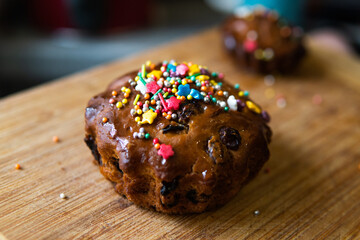 small Easter cake standing on a wooden board