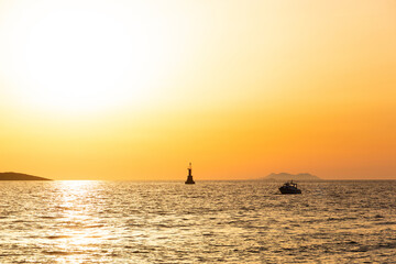 Yacht at sunset in a sea. Soft light.