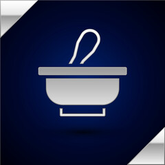 Silver Mortar and pestle icon isolated on dark blue background. Vector