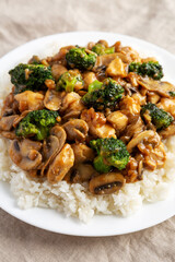 Homemade Chicken Veggie Stir Fry with White Rice, side view. Close-up.