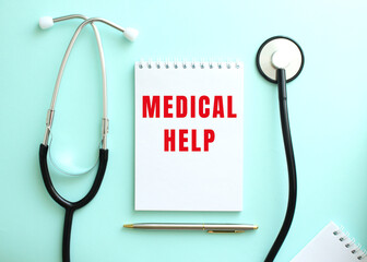 On a blue background, a stethoscope and a white notepad with the red words MEDICAL HELP.