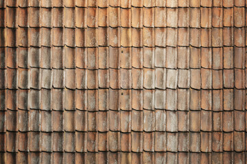 Close up old orange tile roof texture.