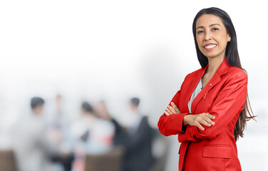 Blurred office interior space with businessman and businesswoman meeting background with copy space.