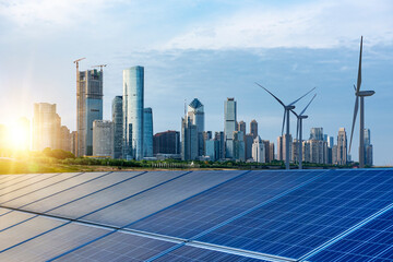 Fototapeta na wymiar Solar photovoltaic panels and wind turbines in cities