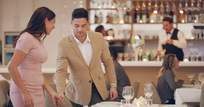 Ill do everything I can to impress her tonight. 4k video footage of a man getting up to greet his date at a restaurant.