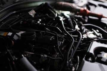 Fototapeta na wymiar New car engine closeup. Powerful engine of modern car