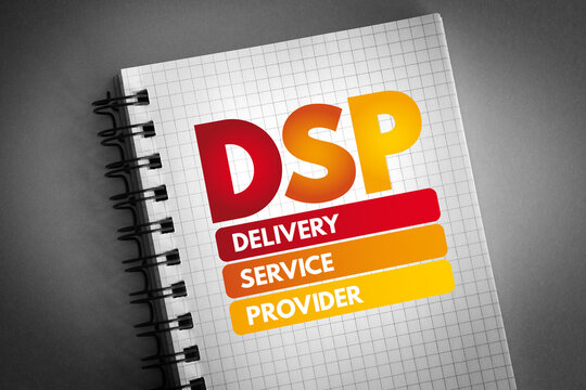 DSP - Delivery Service Provider acronym on notepad, business concept background