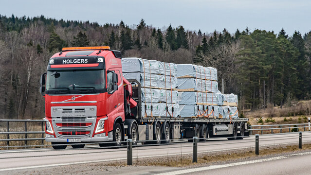 volvo fh long truck on a mtoorway in sweden