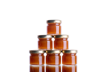 a lot of banos with jam on a white isolated background with reflection