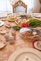 Mediterranean breakfast table. Vegetables, Cheese, olives and other breakfast foods. Front View. Selective Focus